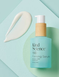 Kind Science Firming Serum product on a mint background