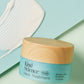 Kind Science Neck Treatment with cream smear on a pastel background