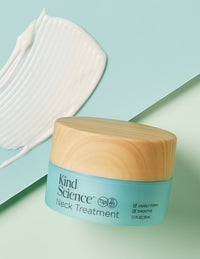 Kind Science Neck Treatment with cream smear on a pastel background