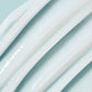 Close-up of light blue skincare cream texture