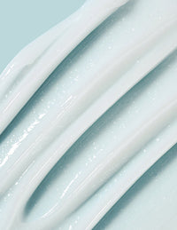 Close-up of light blue skincare cream texture